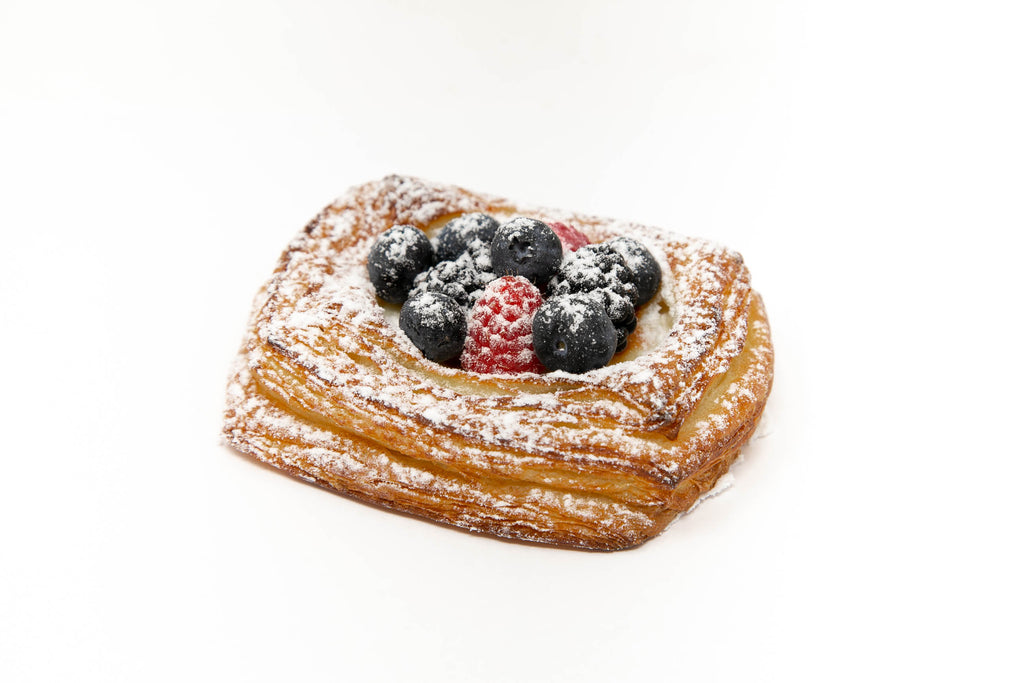 Photo of berry berry pastry with blueberries, raspberries, and blackberries